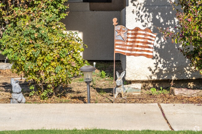 Eagle Ranch boasts rustic front yard decor at a single-family home.