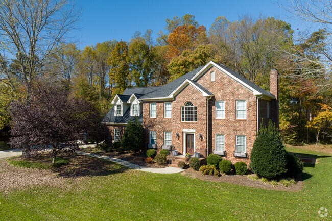 Large homes and yards are common in the Sandy Ridge neighborhood.