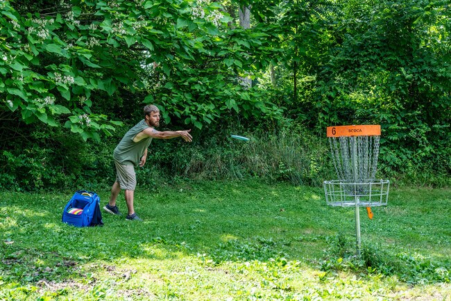 West Park - Columbia residents play disc golf at Oak Ledges Disc Golf Course.