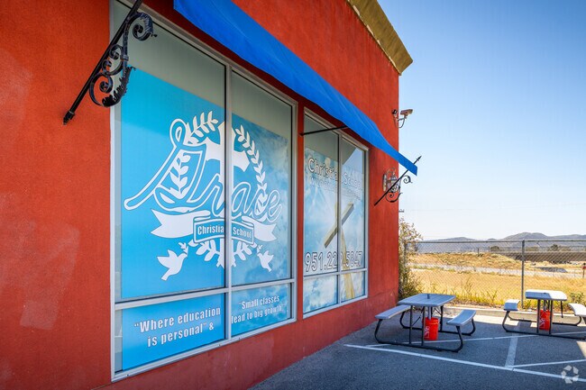 Window featuring the school’s logo seen at Grace Christian School in Wildomar.