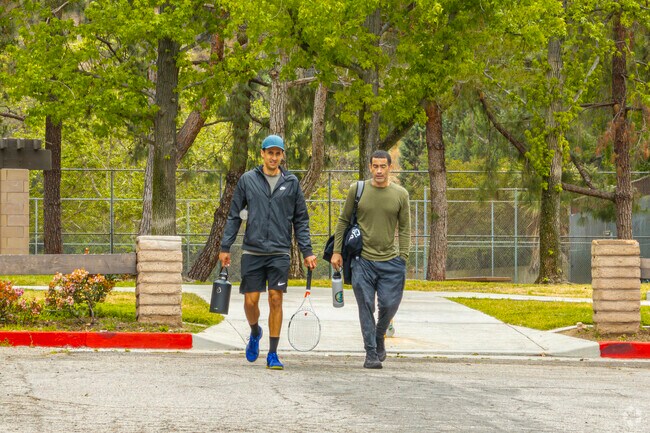 Emerald Isle Park has tennis courts and a playground for locals drive or walk to.