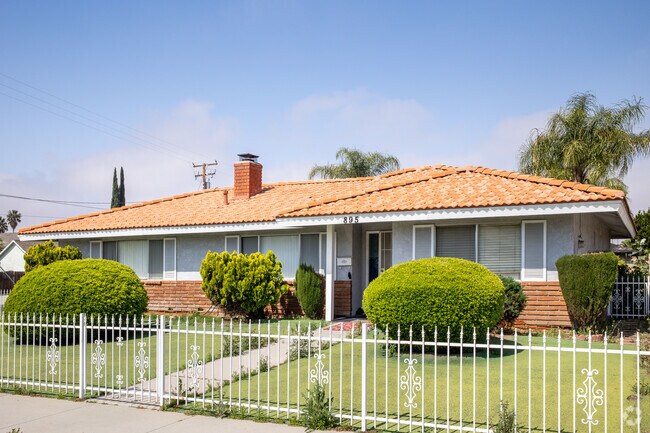 Single-Story homes with freshly cut grass are found in Hemet.