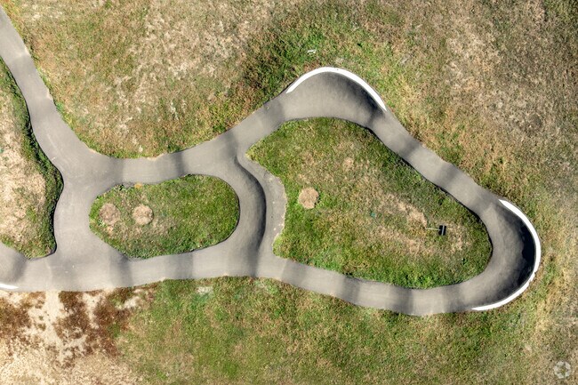 Bikers and Skaters enjoy the short track at Pinehurst Park.