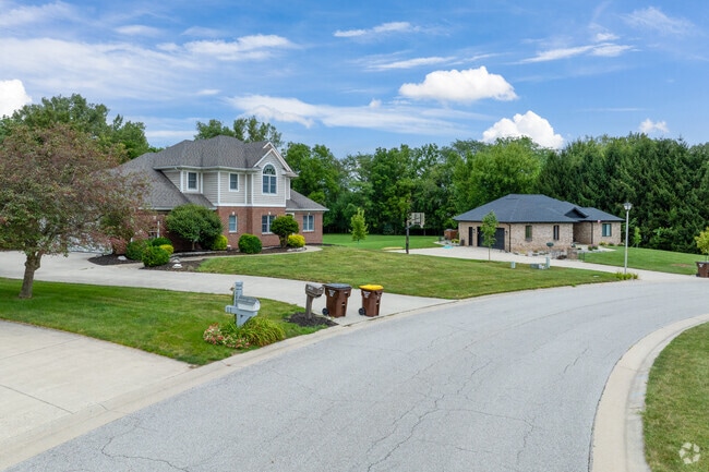 Quiet streets in Hicksville showcase homes with generous spacing and green lawns.