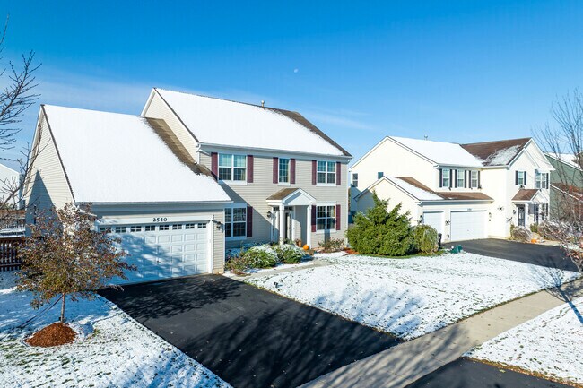 Newly built homes south of Ray Lake Kettle Grove Nature sit on wide lawns and quaint streets.