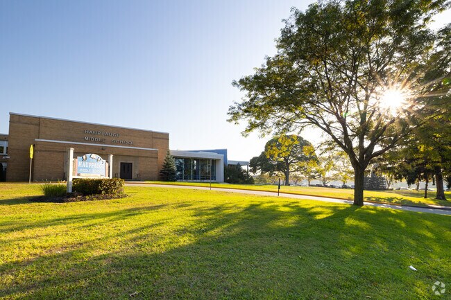 NID507906 Happague Middle School sits right next to Happague High School in a busy neighborhood.