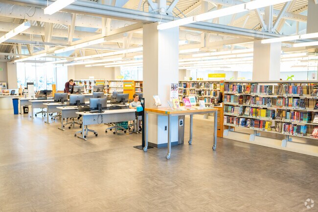 Explore a good novel at the Southwest Oklahoma City Library near Stone Meadows.