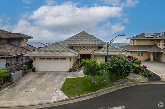 Homes in gated villas in Wailuku have Spanish-inspired roofing.