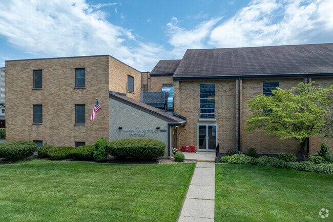 Queen of Martyrs Catholic School has an overall niche.com grade of A.