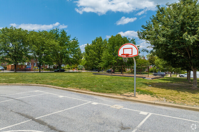 Basketball courts behind Harlan Elementary School in Northwest Wilmington encourages teamwork.