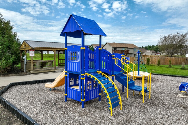 A sheltered den, benches and a playground round out Lions Park.