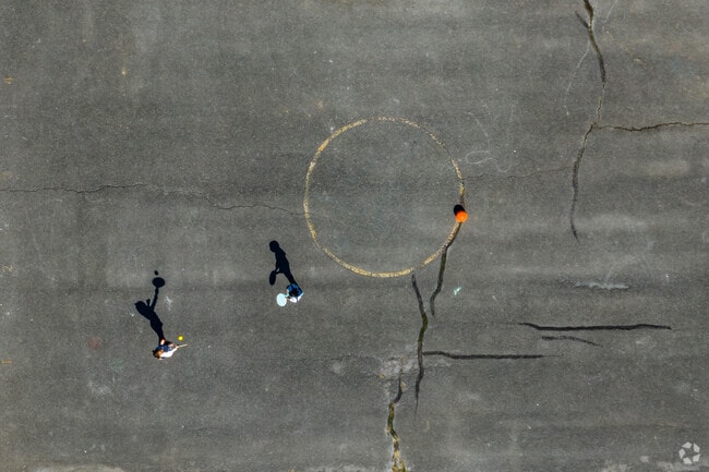 A paddle ball game takes place on one of Monocacy Elementary's multiuse courts.