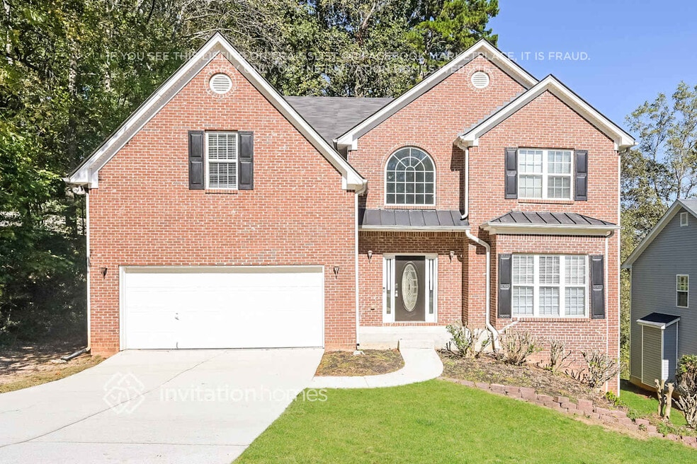 4033 Rivermeade Dr SW, Lilburn, GA 30047 - photo 1