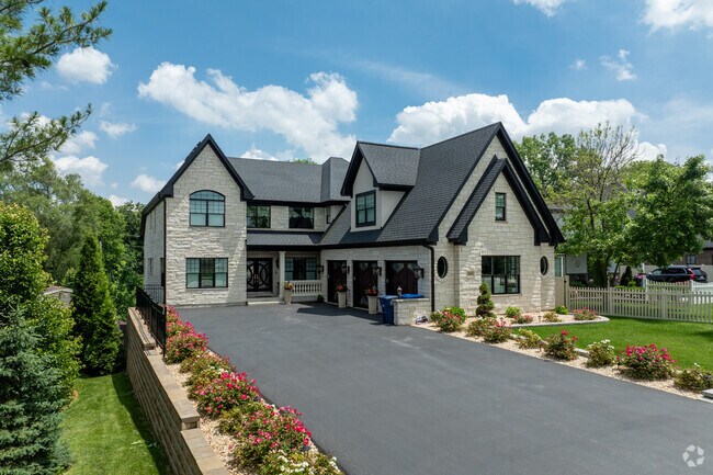 Large traditional homes can be found in Downers Grove Gardens.
