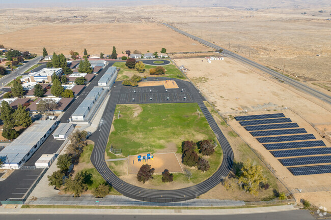 The Track field at Juliet Thorner Elementary is located on the East side of the school.
