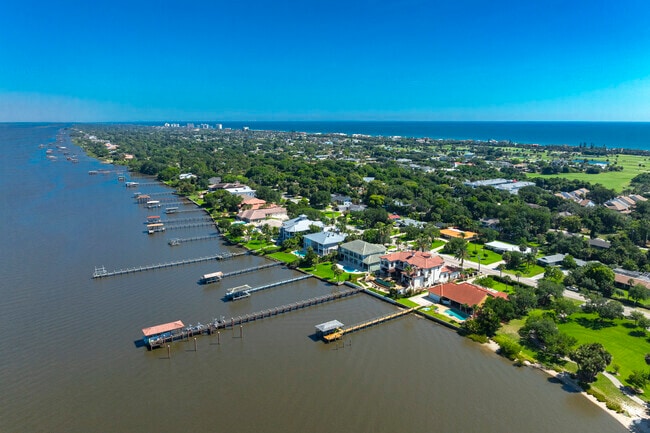 Riverfront homes in Ormond By The Sea include private docks for boating and fishing.