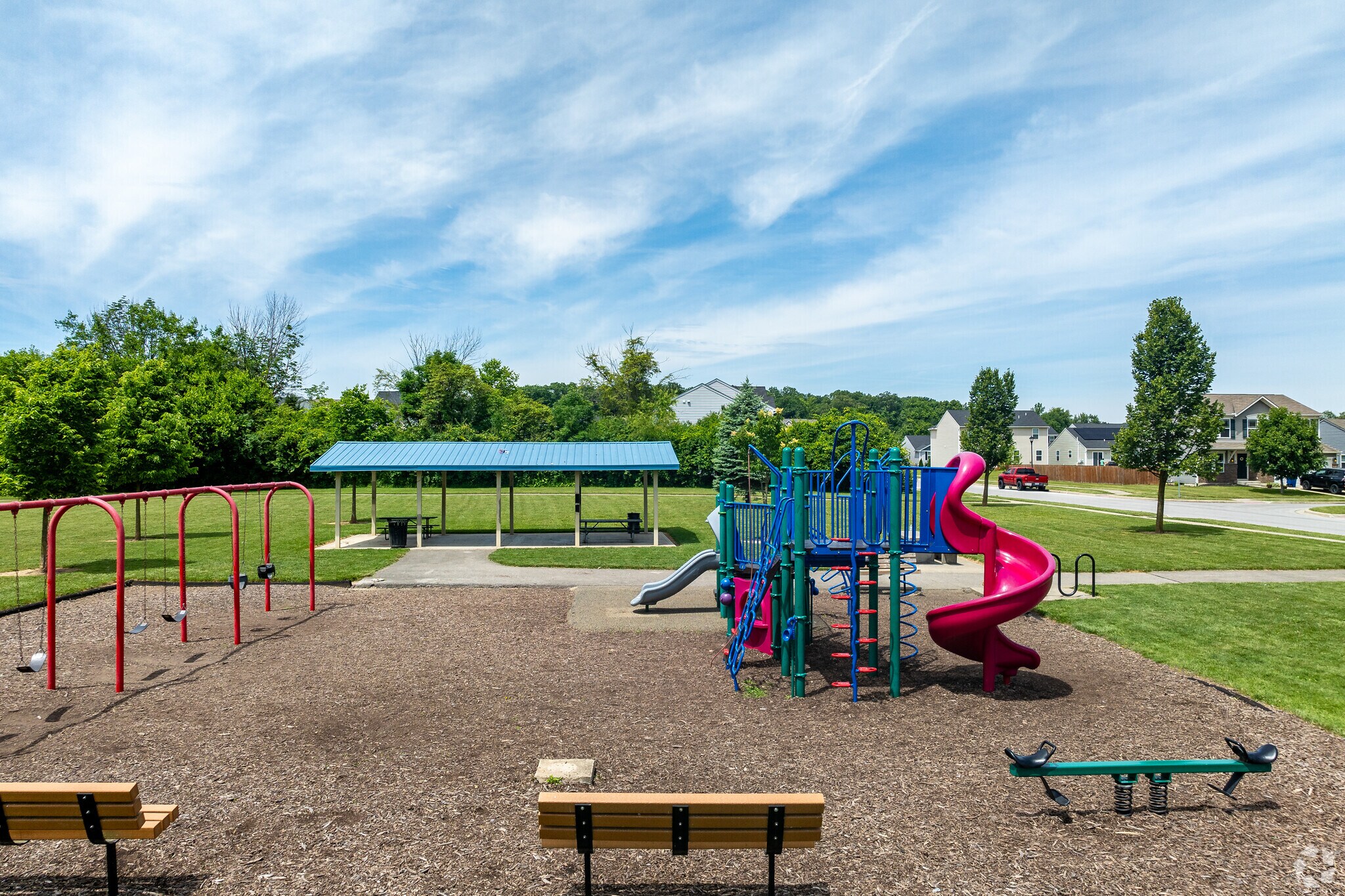 Alkire Woods Park near Holt-Alkire features a playground for children.