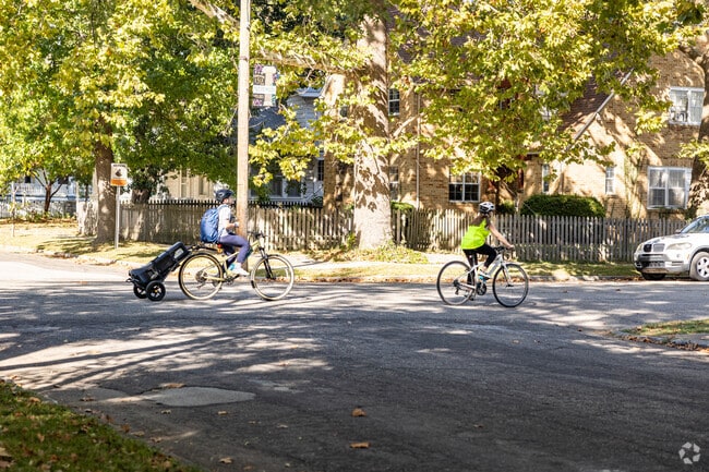 Children ride their bikes through the streets of Byers and Murphy.