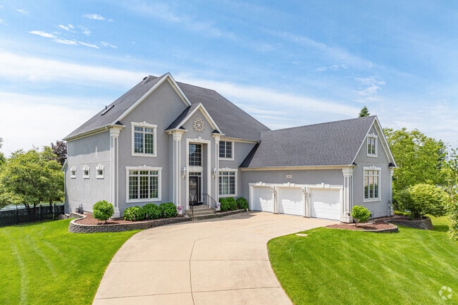 Residents of Wood Lake enjoy large homes surrounded by dense old growth trees.
