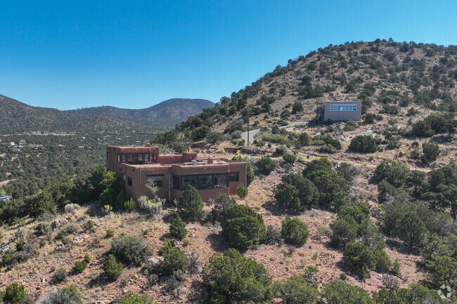 You can spot some homes around Sunlit Hills, built into the hillside for phenomenal views.
