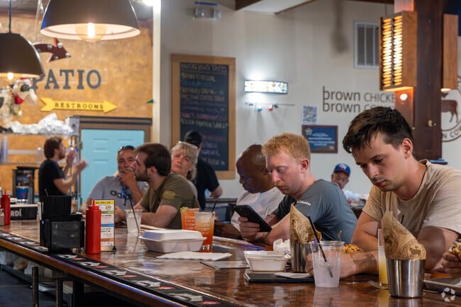 Brown Chicken Brown Cow is a popular burger joint in the evening, attracting Newtown crowds.