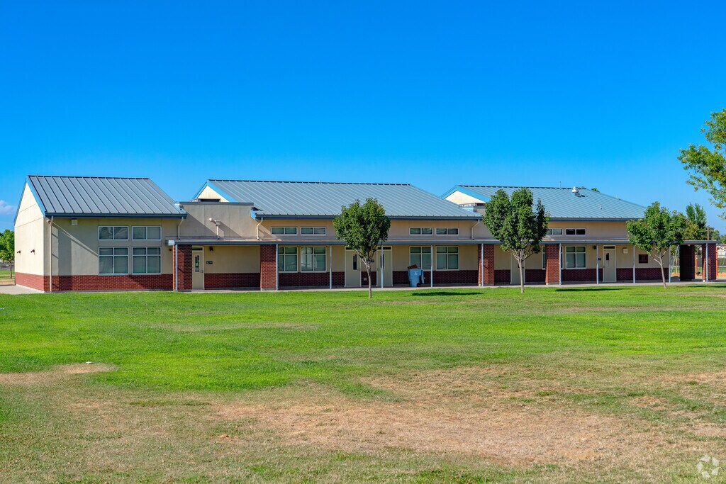 Kids love the large green grass area of Johnson Park Elementary School.