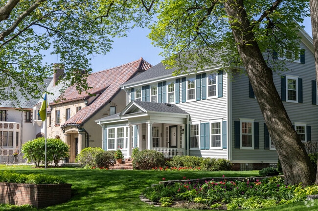 Large two story homes of various styles are common along the streets of Kenwood.