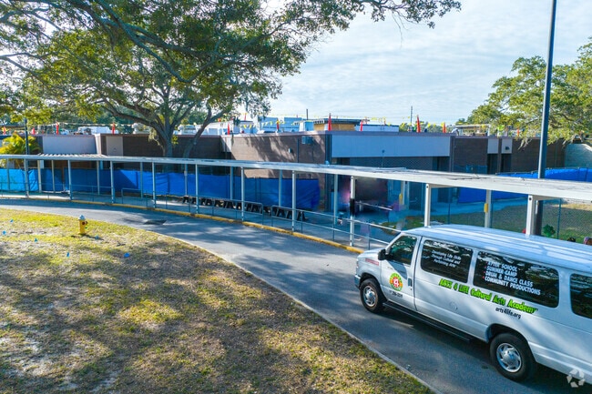 After school vehicles pick up students at Sandy Lane Elementary School.