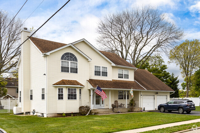 Some of the original smaller homes in Plainedge, NY have been replaced with larger homes.