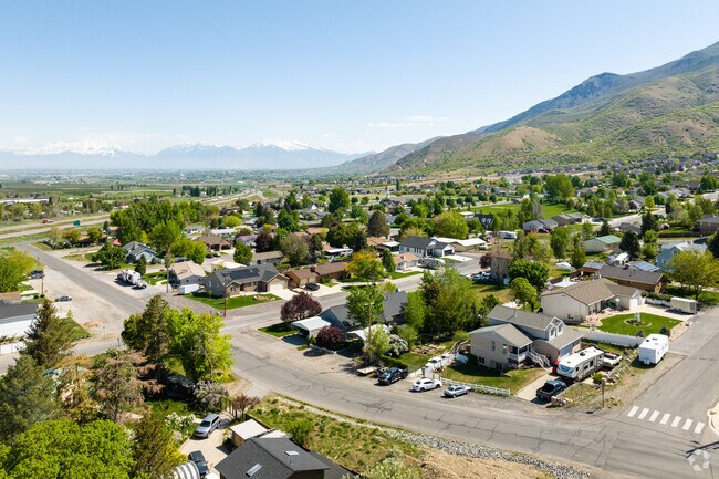 From a bird's eye view, Santaquin unfolds like a captivating tapestry of homes, parks, and natural landscapes.