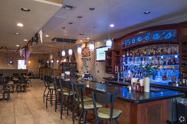 The bar at Zorbo's Restaurant offers unique cocktails in the FBIR neighborhood.