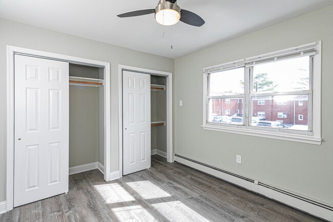 Spacious custom closets and ceiling fans in bedrooms