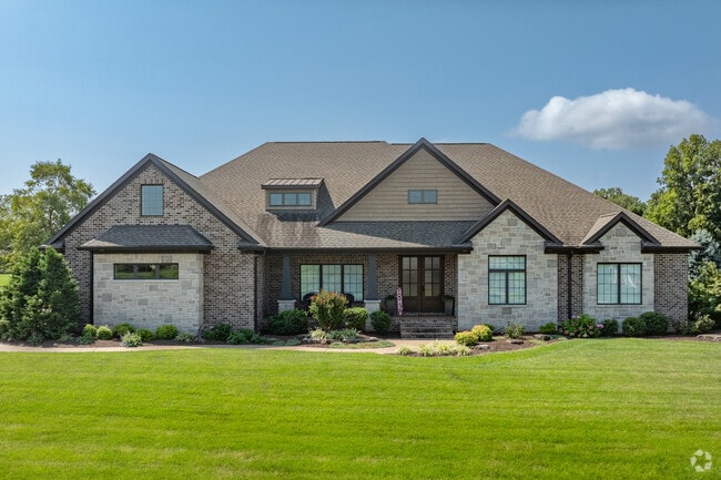 This is a well appointed Craftsman style home in Cambridge Village.