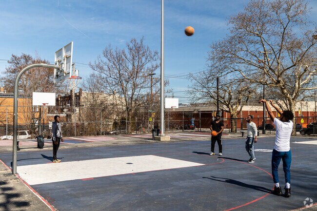 Play basketball with friends at James Allen Shuler Playground in the Allegheny West neighborhood