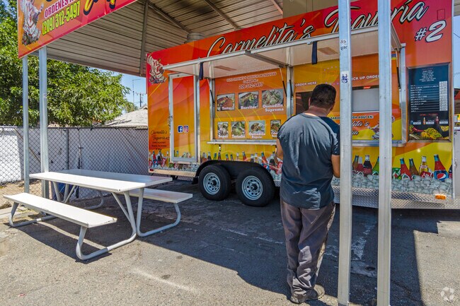 A customer waits for their order at Carmelita's Taqueria taco truck in Keyes.