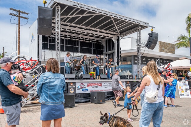 A big stage, live music, and dancing take over the streets of Downtown San Clemente near Coast District.