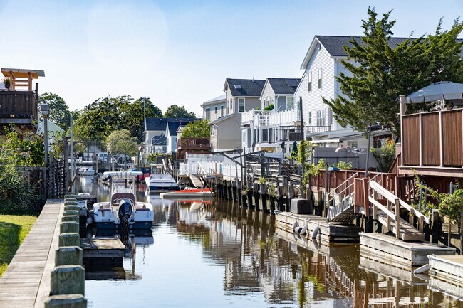 Homes lining Baldwin Harbor's canals have backyard docks.