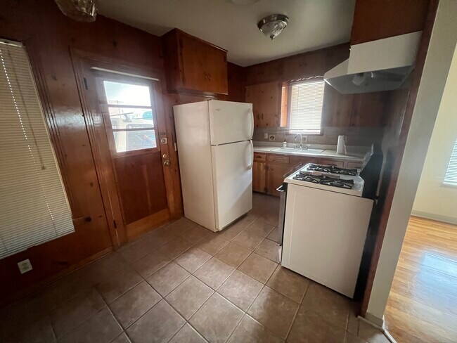 Kitchen view with some cabinetry in view