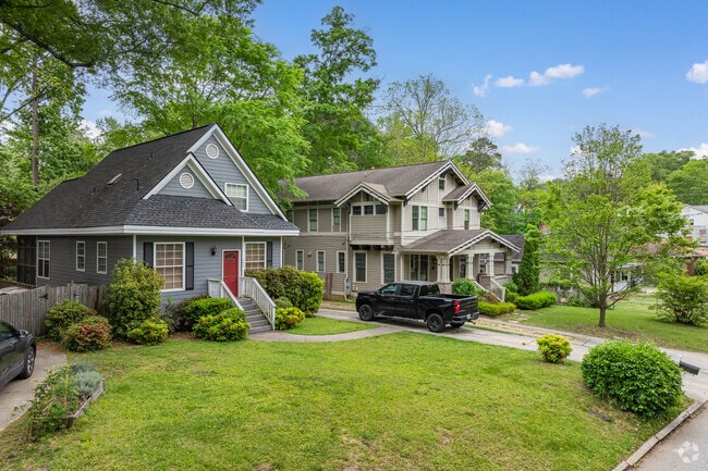 Lined with exquisite Craftsman-style homes, the charming streets of the Oakhurst community exude a warm and inviting atmosphere, where each meticulously designed house showcases intricate woodwork and American craftsmanship, creating a picturesque neighborhood perfect for leisurely strolls.
