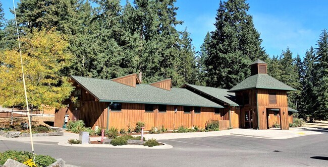 Frontier Park hall exterior that resembles a wood cabin