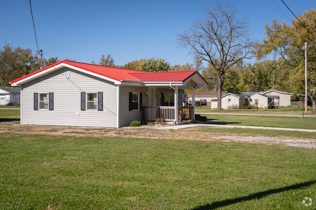 A colorful roof adorns a modest ranch home along the streets of Northwest Perry Township.