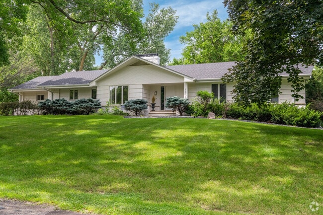 A rambler style house in the Rolling Green - Hilldale neighborhood.