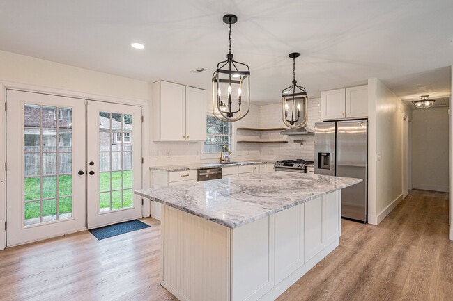 Kitchen with large island and all new appliances