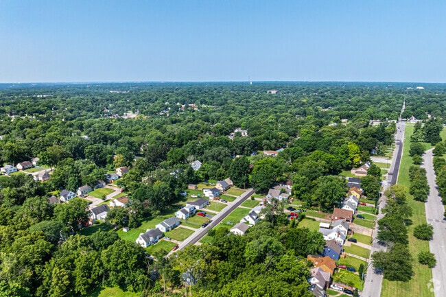 Foxtown East homes are nestled among mature trees and greenery.