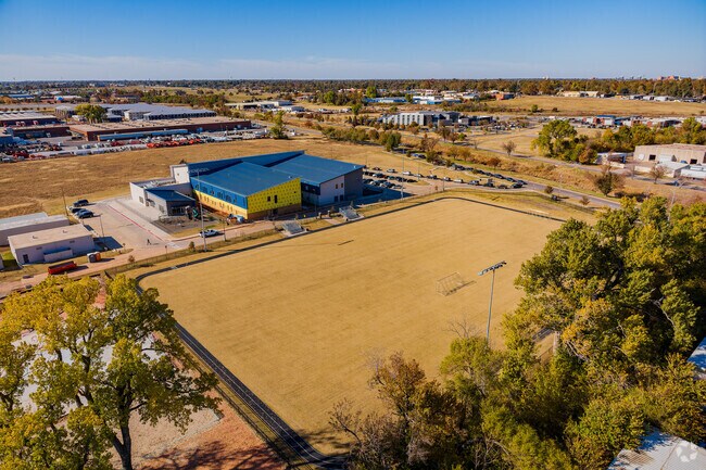 Here is an aerial view of Astec Charter Elementary School with the field