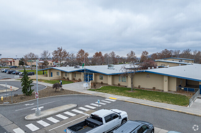 Vista Elementary features a large single story brick building for its students.