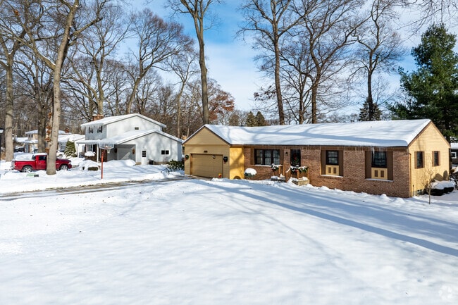 Brick ranch-style homes offers quiet winter living in Laketon Township.