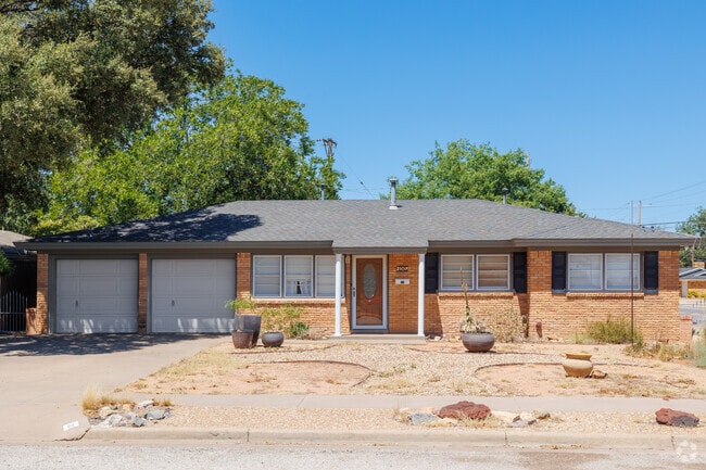 Ranch style homes with stone siding are commonplace in Bayless-Atkins.