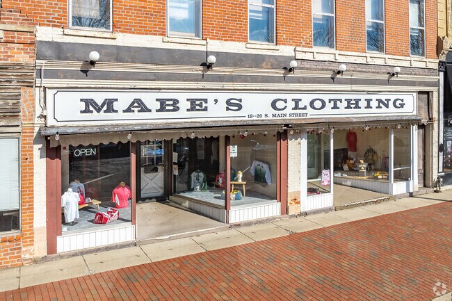 The downtown area of London has a few storefronts and restaurants.