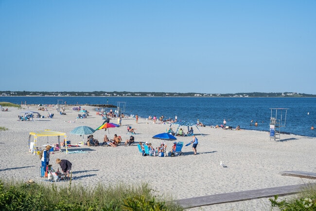 Relax with your feet in the sand at Dowses Beach in Osterville.